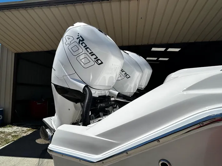  Yacht Photos Pics 2016 Nor-Tech 390 Sport with twin Racing 400 outboard engines in a garage.