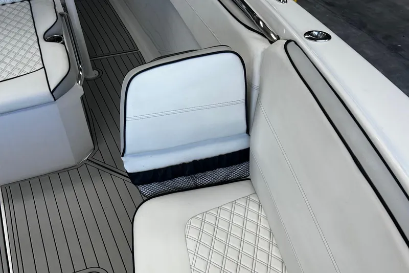  Yacht Photos Pics 2016 Nor-Tech 390 Sport boat interior with white quilted seating and sleek design.