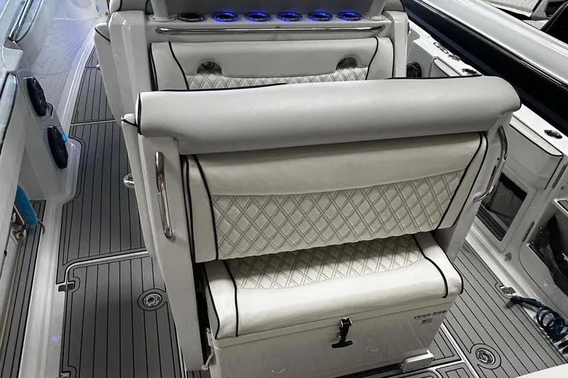  Yacht Photos Pics Luxury seating on a 2016 Nor-Tech 390 Sport boat with diamond-pattern upholstery.