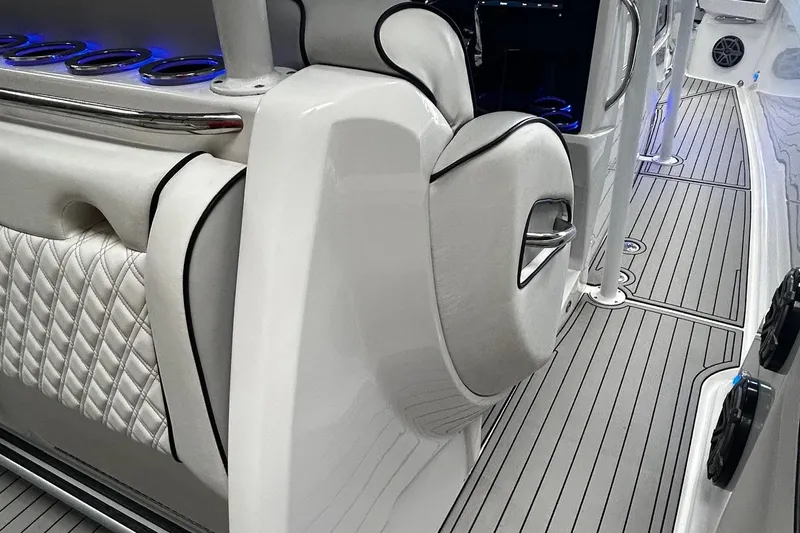  Yacht Photos Pics 2016 Nor-Tech 390 Sport interior with sleek white seating and modern design elements.