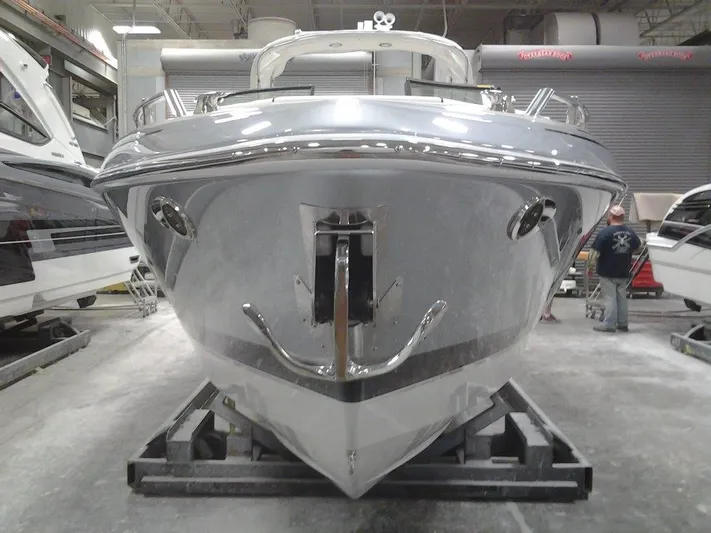Banchors Ours Yacht Photos Pics 2018 Formula 310 Bowrider boat in a showroom, front view.