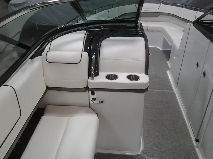 Banchors Ours Yacht Photos Pics 2018 Formula 310 Bowrider interior with white seating and cup holders.