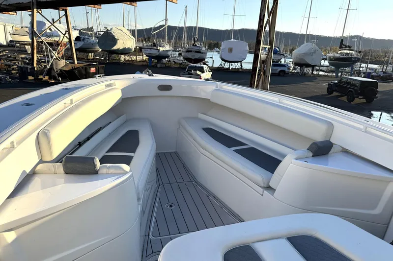 Fansea Pantz Yacht Photos Pics 2019 HCB 39 Speciale boat interior with white seating, docked at marina.