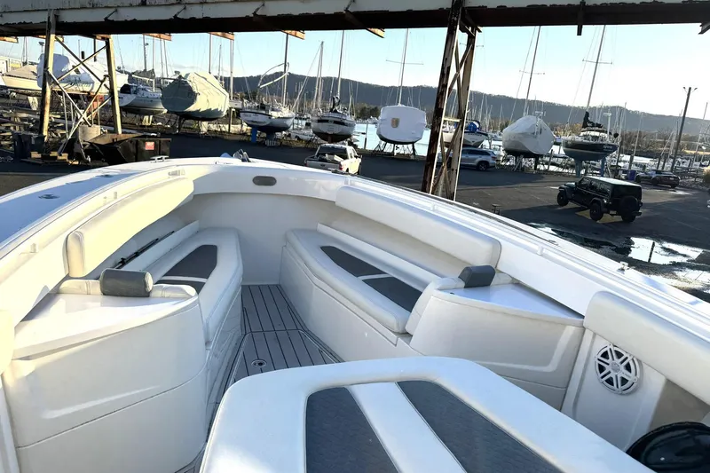 Fansea Pantz Yacht Photos Pics 2019 HCB 39 Speciale boat interior with seating, docked at marina with yachts.