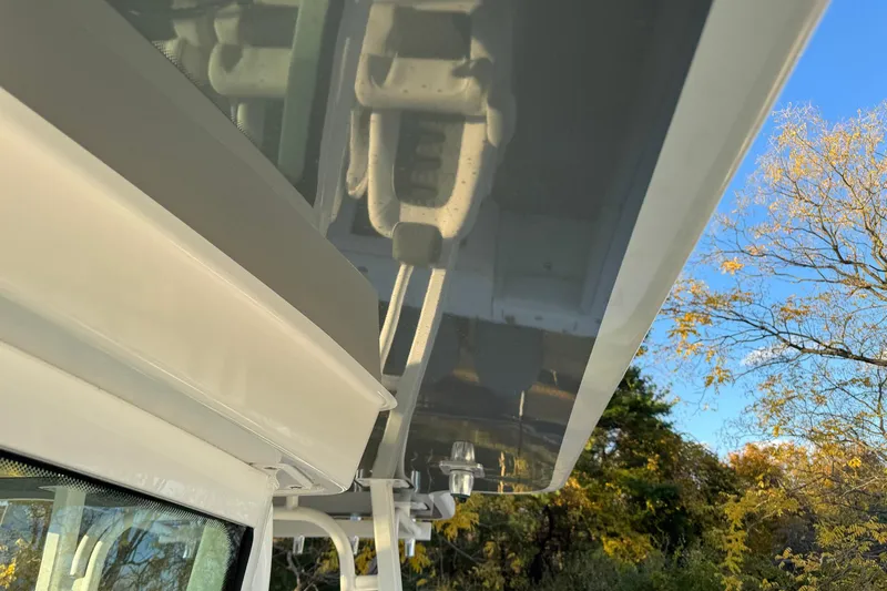 Fansea Pantz Yacht Photos Pics 2019 HCB 39 Speciale boat detail with clear sky and autumn trees.