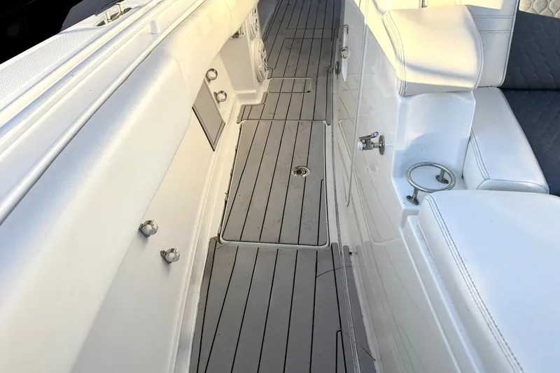 Fansea Pantz Yacht Photos Pics 2019 HCB 39 Speciale boat interior with sleek white seating and deck.