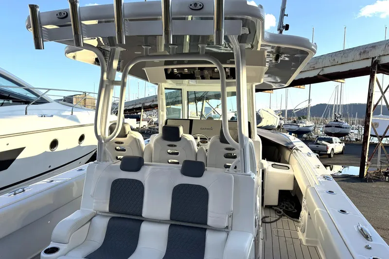 Fansea Pantz Yacht Photos Pics 2019 HCB 39 Speciale boat interior with seating and navigation equipment at a marina.