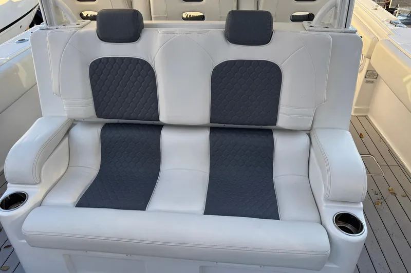 Fansea Pantz Yacht Photos Pics Luxury seating on 2019 HCB 39 Speciale boat with quilted upholstery and cup holders.