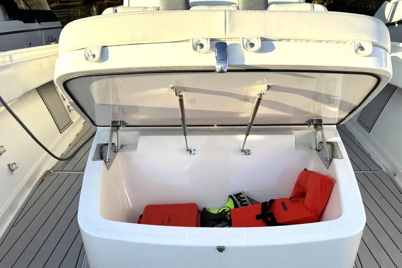 Fansea Pantz Yacht Photos Pics Open storage compartment on 2019 HCB 39 Speciale boat with life jackets inside.