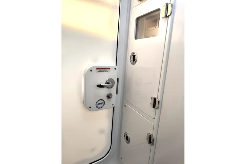 Fansea Pantz Yacht Photos Pics 2019 HCB 39 Speciale cabin door with chrome handle and secure locking mechanism.