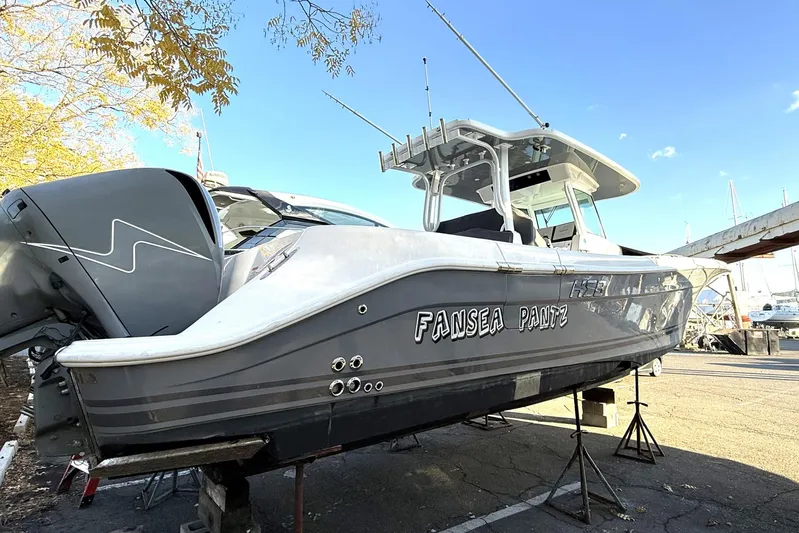 Fansea Pantz Yacht Photos Pics 2019 HCB 39 Speciale boat on dry dock, featuring dual outboard engines.