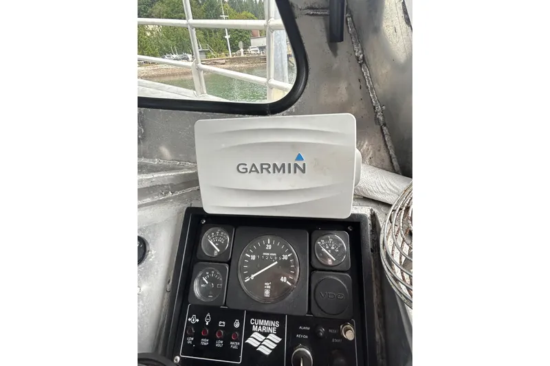 Gig Yacht Photos Pics Control panel of a 1994 Svendsen Marine Works SMW 38 with Garmin device.