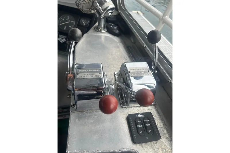 Gig Yacht Photos Pics Control panel of a 1994 Svendsen Marine Works SMW 38 boat with Morse engine controls.