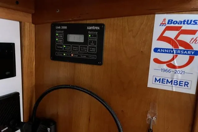 G Force Yacht Photos Pics Interior of 2004 J Boats J/133 with Xantrex Link 2000 panel and BoatUS 55th Anniversary sticker.