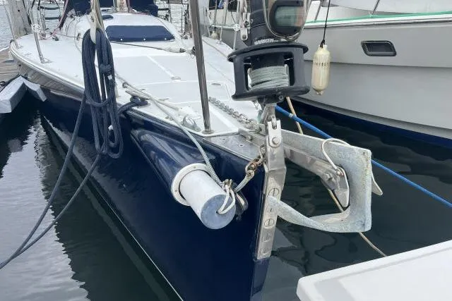 G Force Yacht Photos Pics 2004 J Boats J/133 sailboat docked, featuring anchor and deck details.