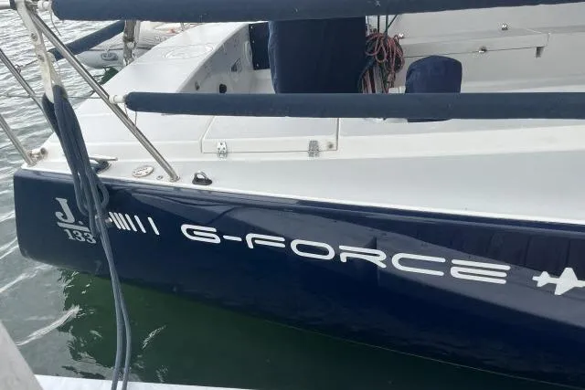 G Force Yacht Photos Pics 2004 J Boats J/133 sailboat named "G-Force" docked at a marina.