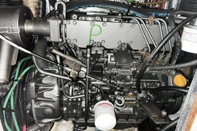 G Force Yacht Photos Pics Engine of a 2004 J Boats J/133 sailboat, featuring Yanmar components and intricate wiring.
