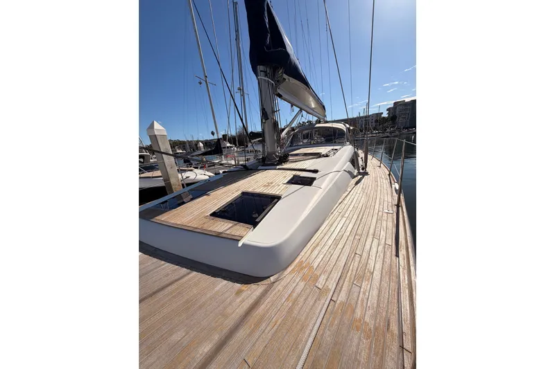 Gazelle II Yacht Photos Pics Luxurious 2015 Beneteau Oceanis Yacht 60 docked, showcasing sleek deck design under clear skies.