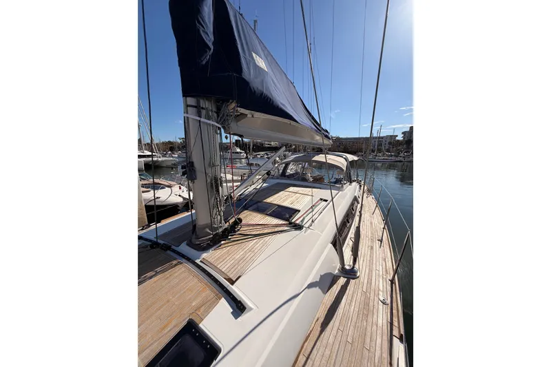 Gazelle II Yacht Photos Pics Beneteau Oceanis Yacht 60, 2015 model, docked with sails furled, sunny marina view.