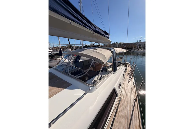 Gazelle II Yacht Photos Pics Beneteau Oceanis Yacht 60, 2015 model, docked in a sunny marina.