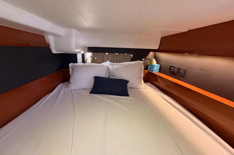 Gazelle II Yacht Photos Pics Luxurious cabin interior of 2015 Beneteau Oceanis Yacht 60 with cozy bedding.