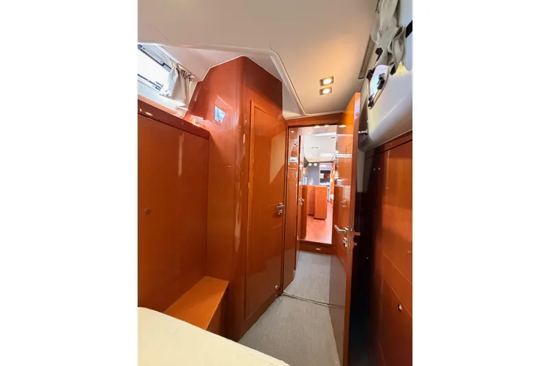 Gazelle II Yacht Photos Pics Interior of 2015 Beneteau Oceanis Yacht 60, featuring polished wood finishes and modern design.