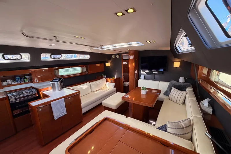 Gazelle II Yacht Photos Pics Luxurious interior of 2015 Beneteau Oceanis Yacht 60 with elegant seating and modern amenities.
