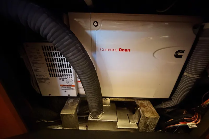 Gazelle II Yacht Photos Pics Engine room of 2015 Beneteau Oceanis Yacht 60 with Cummins Onan generator.