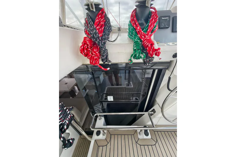 Old Marblehead Yacht Photos Pics 2019 Leopard 50 yacht deck with colorful ropes and modern equipment.