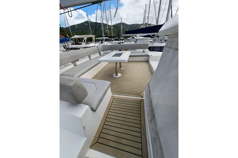 Old Marblehead Yacht Photos Pics Luxurious Leopard 50 yacht deck with seating and table, 2019 model, docked at marina.