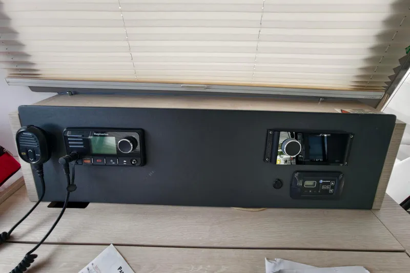 Old Marblehead Yacht Photos Pics Control panel of a 2019 Leopard 50 yacht with communication and navigation equipment.