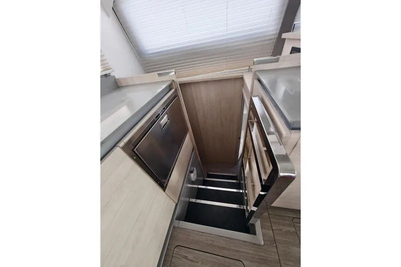 Old Marblehead Yacht Photos Pics Staircase in 2019 Leopard 50 yacht interior with modern design and stainless steel accents.