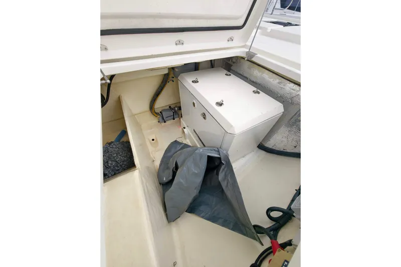 Old Marblehead Yacht Photos Pics 2019 Leopard 50 yacht storage compartment with equipment and cables.
