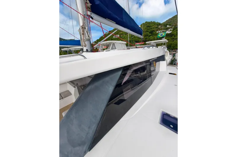 Old Marblehead Yacht Photos Pics 2019 Leopard 50 yacht with sleek design and modern features, docked in a scenic marina.