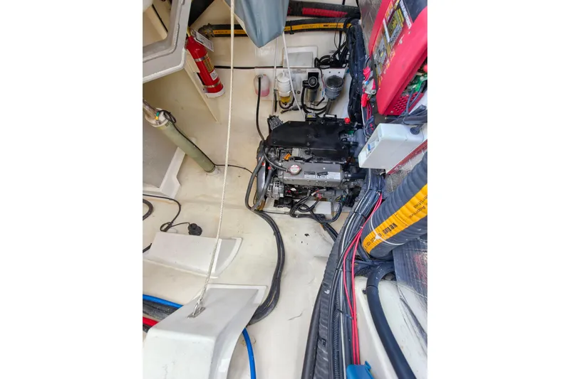 Old Marblehead Yacht Photos Pics Engine room of a 2019 Leopard 50 yacht with visible wiring and equipment.