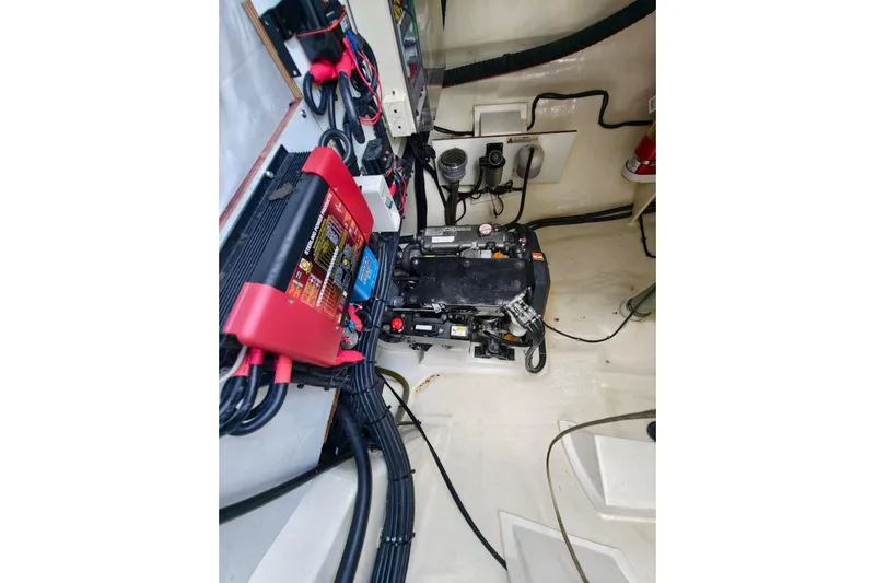Old Marblehead Yacht Photos Pics Electrical system inside a 2019 Leopard 50 yacht, featuring wiring and battery components.
