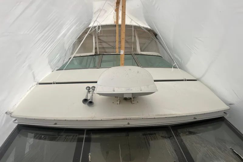 Betty Jean Yacht Photos Pics 2000 Carver 530 Voyager Pilothouse yacht under protective cover, front view.