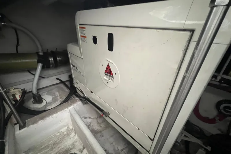 Betty Jean Yacht Photos Pics Engine room of 2000 Carver 530 Voyager Pilothouse with Kohler generator.