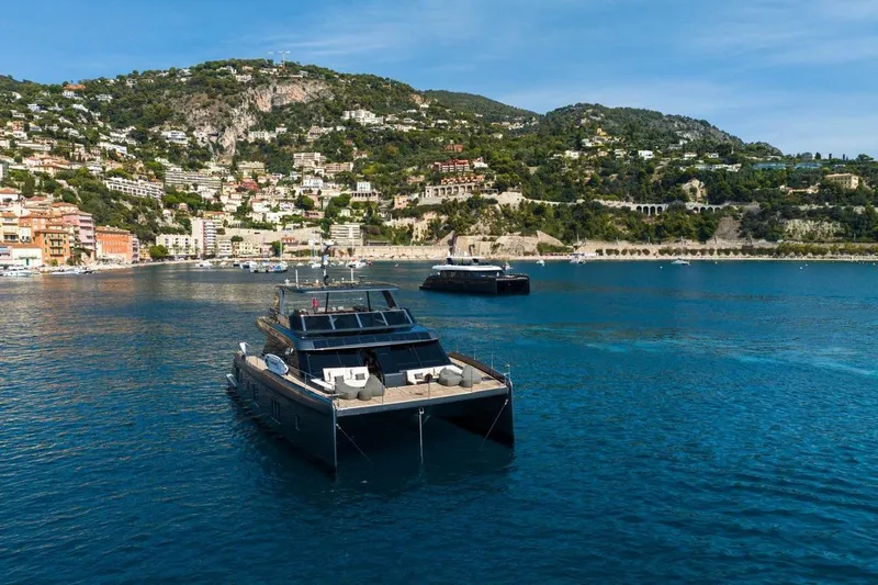 Double Happiness Yacht Photos Pics 2024 Sunreef 60 Sunreef Power Eco yacht in scenic coastal waters.