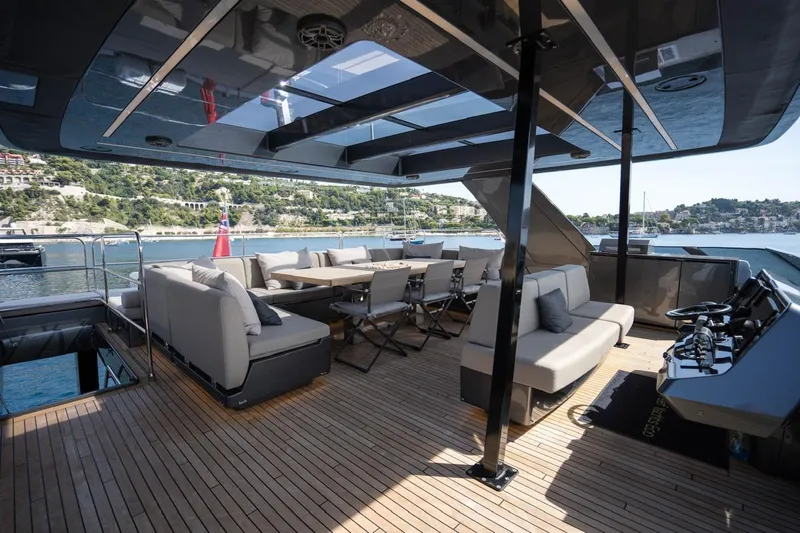 Double Happiness Yacht Photos Pics Luxurious 2024 Sunreef 60 Sunreef Power Eco yacht deck with elegant seating and scenic views.