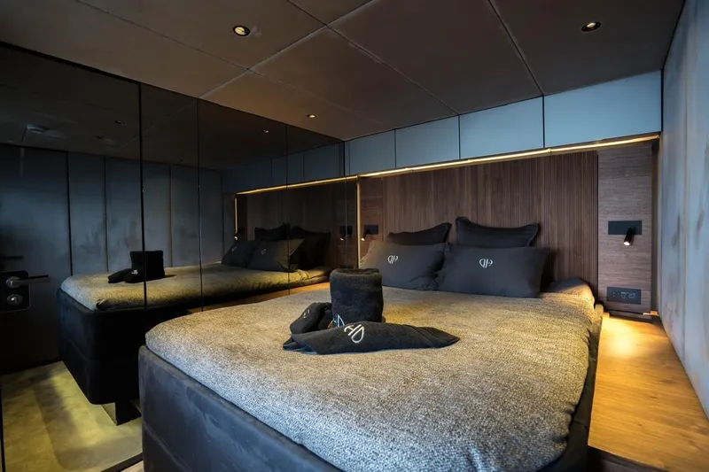 Double Happiness Yacht Photos Pics Luxurious bedroom interior of 2024 Sunreef 60 Sunreef Power Eco yacht with modern design.