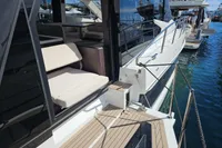 2025 Galeon 480 Fly yacht with sleek design and luxurious seating on deck.
