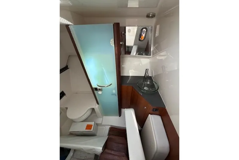  Yacht Photos Pics 2025 Pursuit DC 365 Dual Console interior with modern bathroom and sleek design.