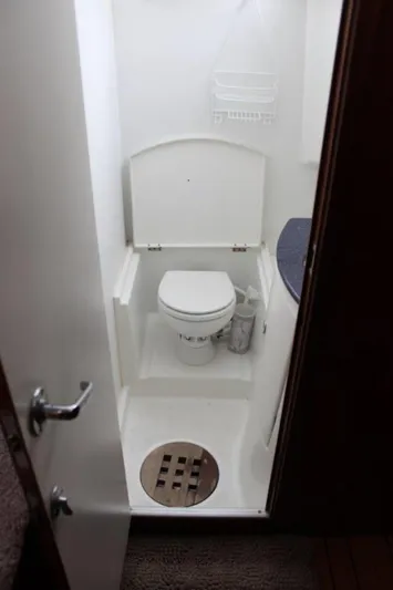Mangata Yacht Photos Pics 2003 Lagoon 43 PC yacht bathroom with toilet and shower.