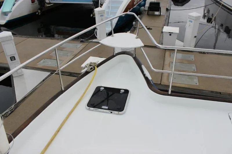 Mangata Yacht Photos Pics Bow view of 2003 Lagoon 43 PC yacht docked at marina.