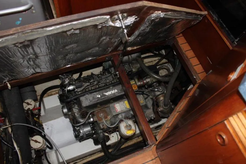 Mangata Yacht Photos Pics Engine compartment of a 2003 Lagoon 43 PC boat, showcasing mechanical components.