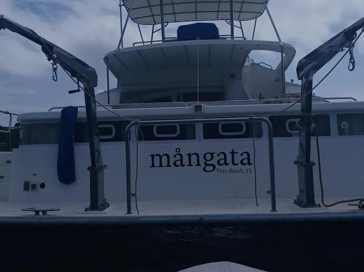 Mangata Yacht Photos Pics Lagoon 43 PC 2003 yacht named "Mångata" docked in Vero Beach, FL.