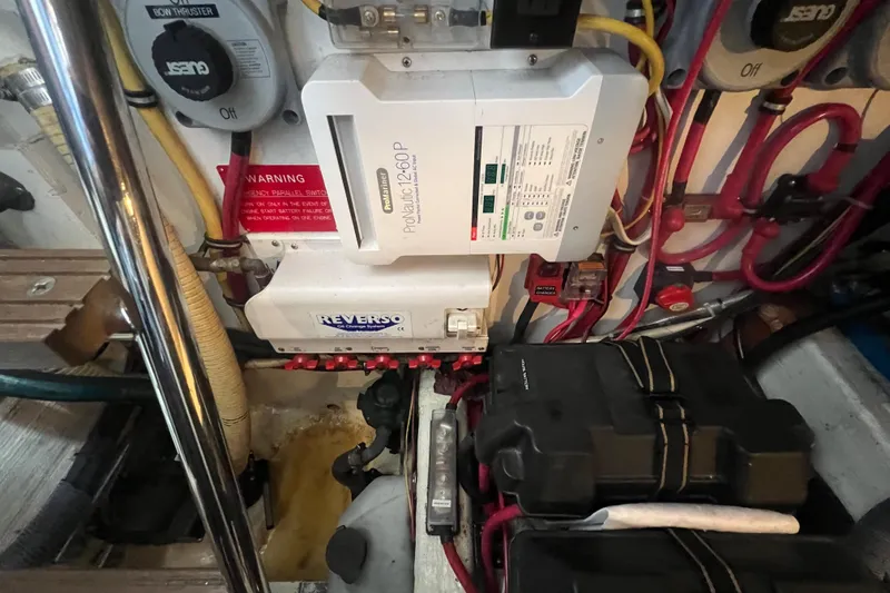 Semper Fi Yacht Photos Pics Engine room of a 2004 Sabre 36 Hardtop Sedan with electrical components and wiring.