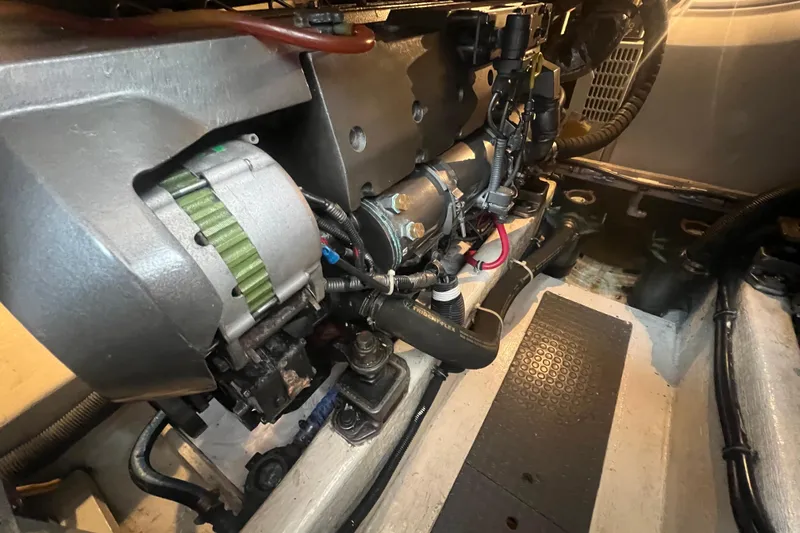 Semper Fi Yacht Photos Pics Engine compartment of a 2004 Sabre 36 Hardtop Sedan boat, showcasing mechanical components.