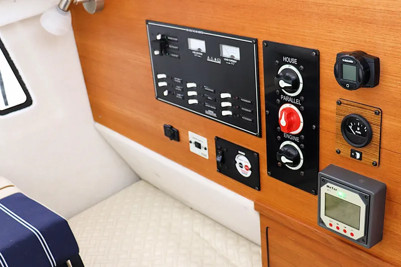 Tail Finn Yacht Photos Pics Control panel of 2021 Ranger Tugs R-27 boat with switches and gauges.